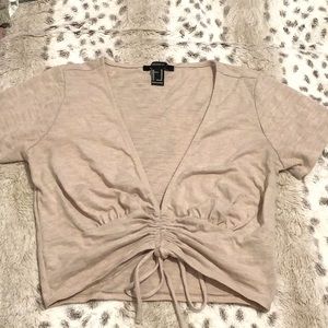 Low cleavage crop top